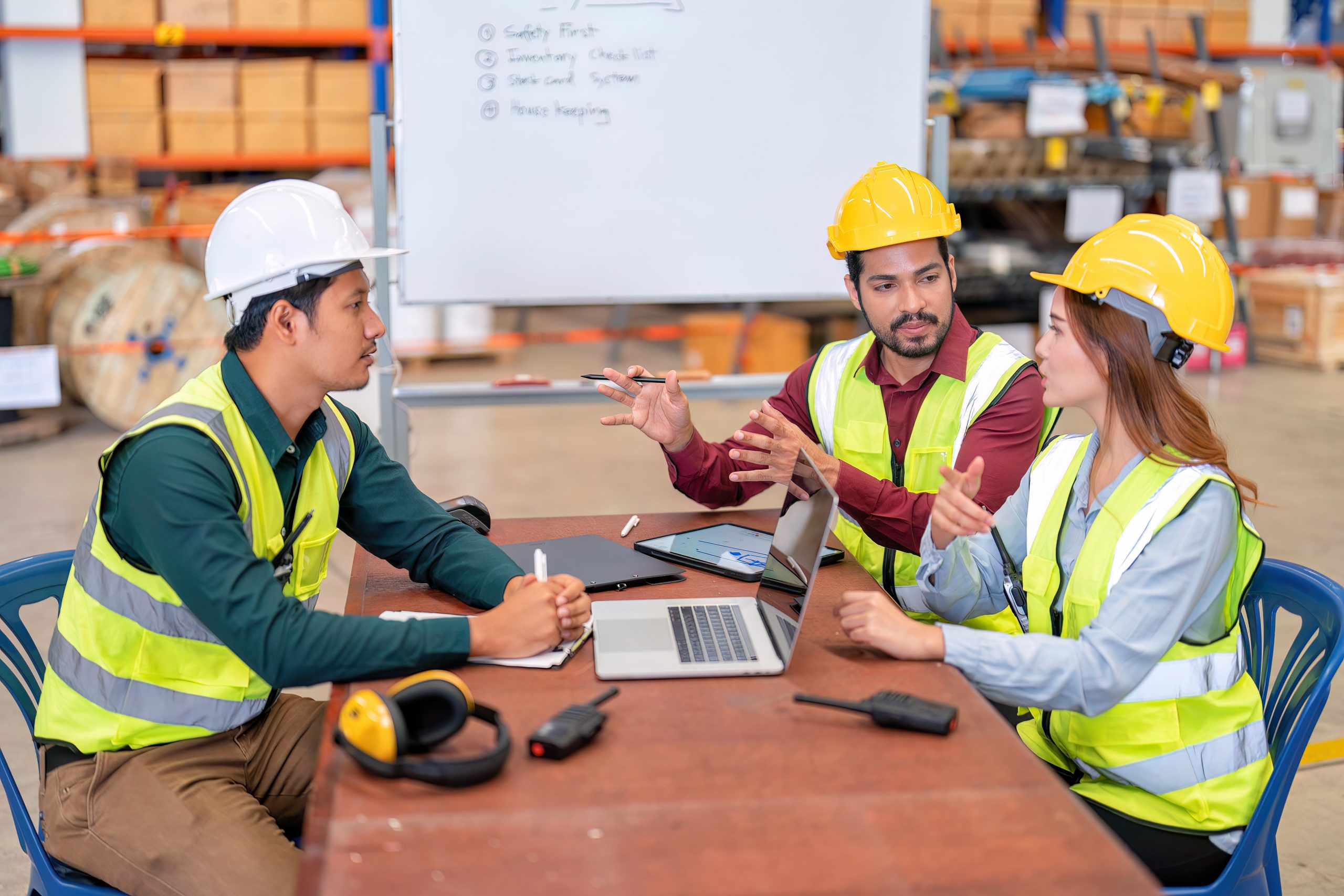 Group of worker in the warehouse factory conduct toolbox talk daily meeting focus on safety priority and house keeping in the morning before start working