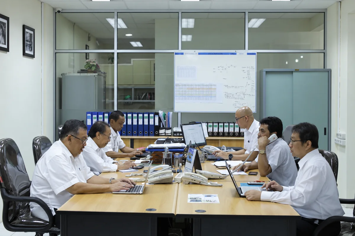 Chemindo team members working together in the office